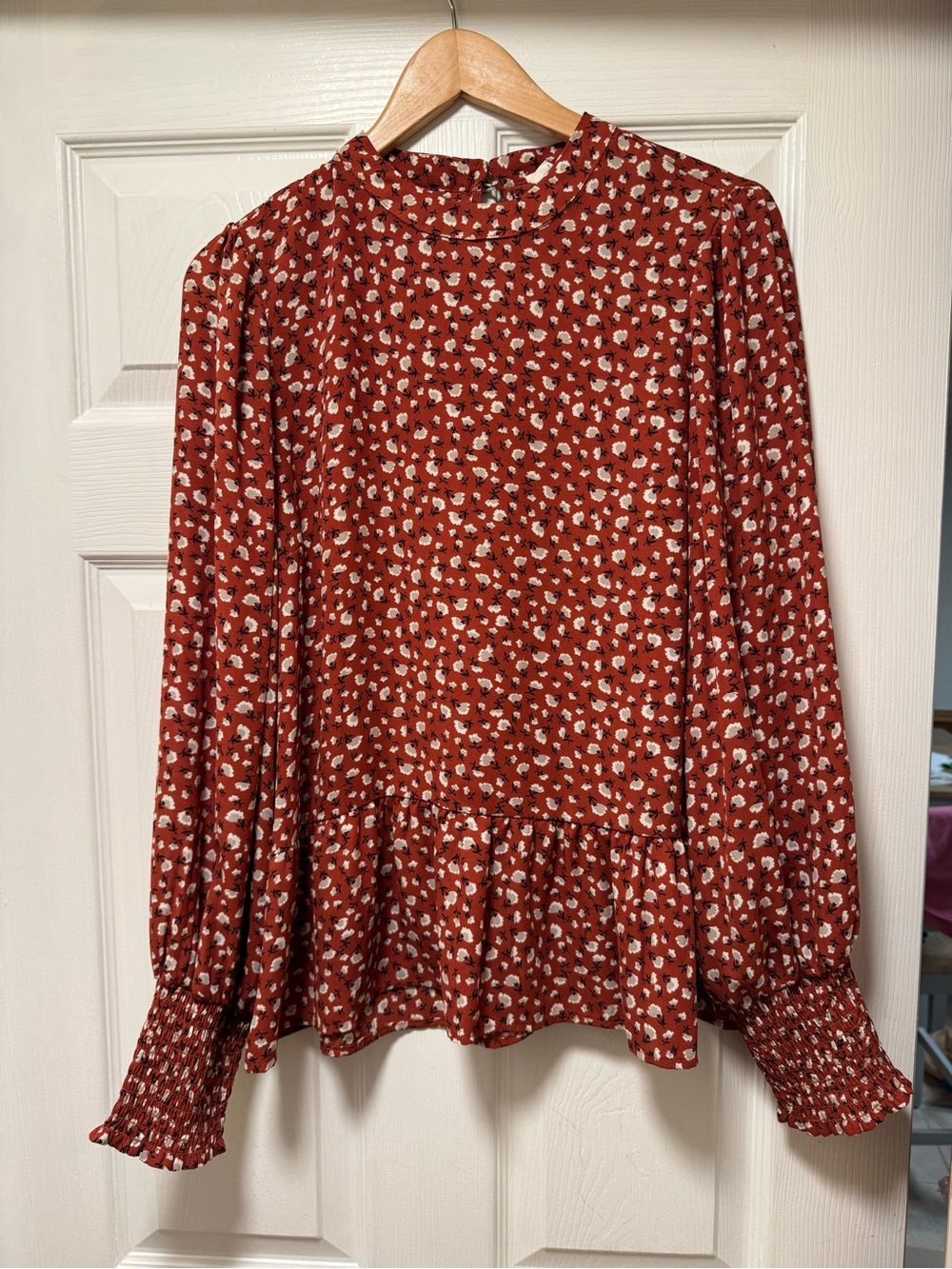Sienna Sky Rust Floral Peplum Blouse